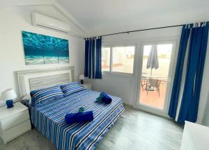 Posteľ alebo postele v izbe v ubytovaní Monte Duquesa - 4 bedroom apt, 3 bathrooms close to Port and Beach, communal pool