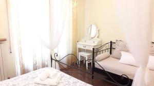 Postel nebo postele na pokoji v ubytování B&B Le Mi' Cocche