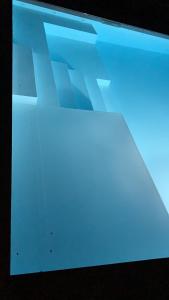 a television screen with a blue light on it at Appartamenti Villa Andrea in Garda