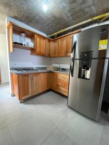 A kitchen or kitchenette at Apartamento Diana
