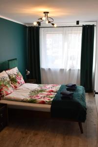 Llit o llits en una habitació de Loft Apartament ULA