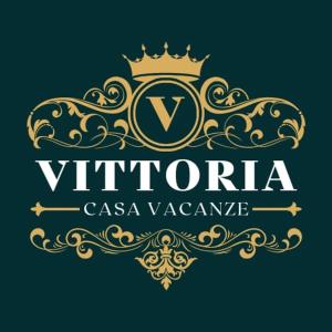 塔蘭托的住宿－Casa Vacanze VITTORIA，顶部有冠的老式标志