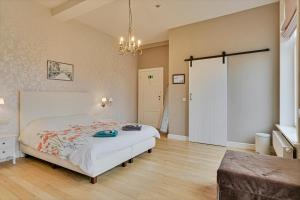 Llit o llits en una habitació de Oud Brouwershof