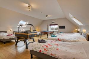 Llit o llits en una habitació de Oud Brouwershof