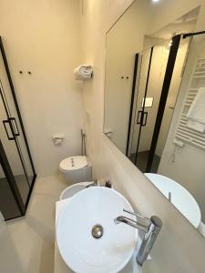 Łazienka w obiekcie Hotel Regina