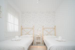 Sol y Vida, Apartamentos Living Surにあるベッド