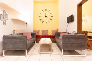 A seating area at Federighi Comfort Apartment