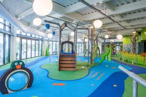 a playground in a building with a play area at Tattershall Lakes Country Park in Tattershall