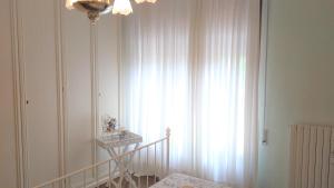 Postel nebo postele na pokoji v ubytování B&B Le Mi' Cocche
