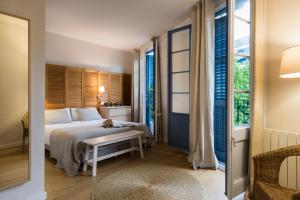 Postel nebo postele na pokoji v ubytování Bed&BCN Diagonal 4