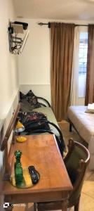 A bed or beds in a room at Colosseum B