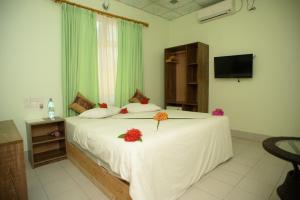 Letto o letti in una camera di Summer Vibes Beach Front