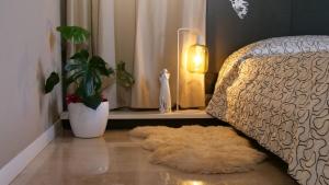 A bed or beds in a room at Квартира люкс в Милане (Appartamento di lusso a Milano)
