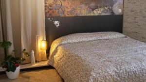 A bed or beds in a room at Квартира люкс в Милане (Appartamento di lusso a Milano)