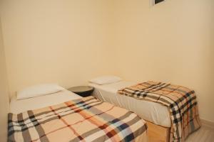 Letto o letti in una camera di Summer Vibes Beach Front