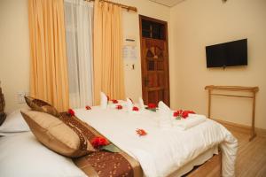 Letto o letti in una camera di Summer Vibes Beach Front