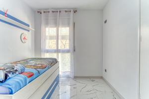 Posteľ alebo postele v izbe v ubytovaní Blaumar 6 G Roses - Immo Barneda