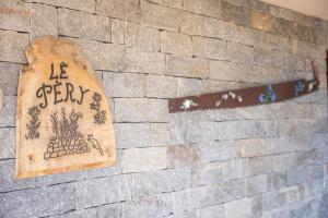 Certifikát, hodnocení, plakát nebo jiný dokument vystavený v ubytování Au Chalet Le Péry, vue sur le Mont de Grange