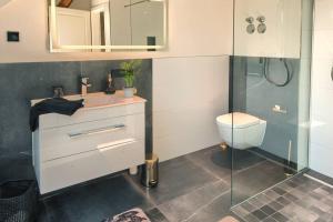 Koupelna v ubytování Ferienwohnungen im Palmengarten - 70 qm