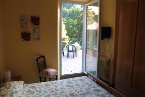 A bed or beds in a room at Hotel Il Nibbio