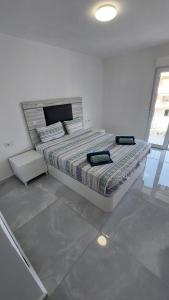 Posteľ alebo postele v izbe v ubytovaní Ibi Apartamentos la Cantera Peñíscola