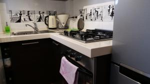 A kitchen or kitchenette at Квартира люкс в Милане (Appartamento di lusso a Milano)