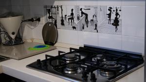 A kitchen or kitchenette at Квартира люкс в Милане (Appartamento di lusso a Milano)