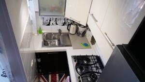 A kitchen or kitchenette at Квартира люкс в Милане (Appartamento di lusso a Milano)
