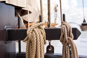 a close up of ropes on a boat at Panta Rhei Classic Hostel Ship in Amsterdam