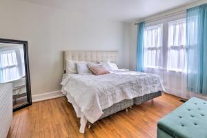 a bedroom with a bed and a large window at Birmingham Vacation Rental 9 Miles to Downtown! in Birmingham