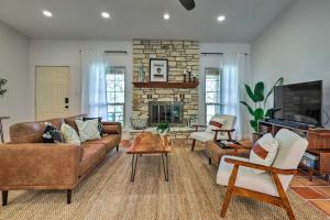 a living room with a couch and a fireplace at San Marcos Vacation Rental 4 Miles to Downtown! in San Marcos