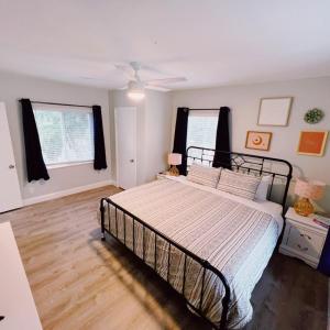a bedroom with a large bed in a room at The Leeward Apartments By Lowkl in Fort Lauderdale