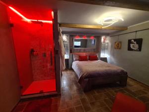A bed or beds in a room at Onlyfor2 un nido d'amore per la coppia