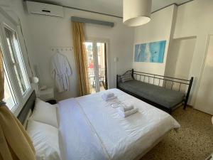 Кровать или кровати в номере Sunset view Rooms
