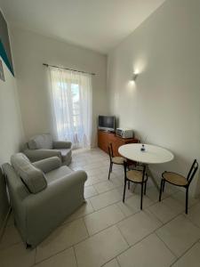 Χώρος καθιστικού στο PAHome - Trilocale Piazza Fontana Grande LT
