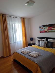 Postel nebo postele na pokoji v ubytování Casa Silvana