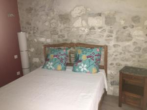 Posteľ alebo postele v izbe v ubytovaní Petite maison sur jardin secret