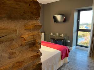 Posteľ alebo postele v izbe v ubytovaní A Finca Hotel