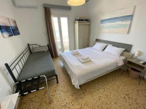 Кровать или кровати в номере Sunset view Rooms