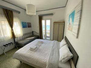 Кровать или кровати в номере Sunset view Rooms