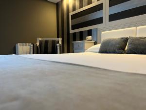Posteľ alebo postele v izbe v ubytovaní A Finca Hotel