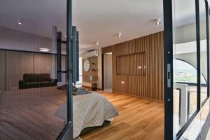 Postel nebo postele na pokoji v ubytování Luxurious Maisonette with Pool in Xaghra