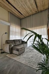 Posezení v ubytování Luxurious Maisonette with Pool in Xaghra