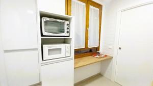 A kitchen or kitchenette at Narciso Tomé en San justo 4