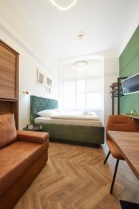 Postel nebo postele na pokoji v ubytování Nove Boutique Apartments