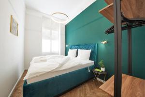 Postel nebo postele na pokoji v ubytování Nove Boutique Apartments