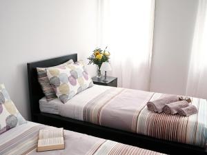 Una cama o camas en una habitación de MI. Style