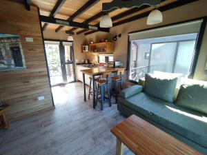 Et opholdsområde på Girasoles Home Duplex + 16 billeder