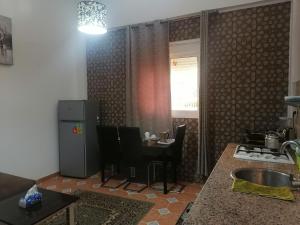 Kuchyň nebo kuchyňský kout v ubytování studio apartment