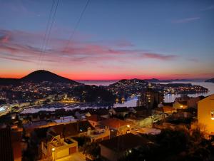 a view of a city at night at Villa Ivan in Dubrovnik